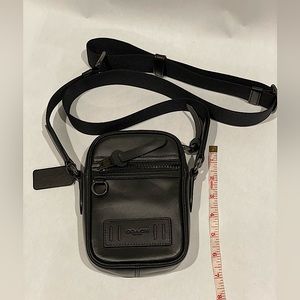 Small Black Coach cross-body bag